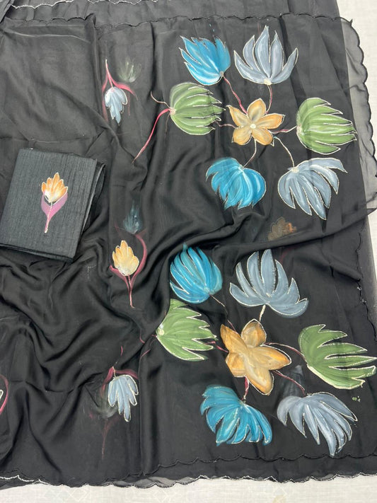Elegant Hand-Painted Organza Saree with Artistic Floral Motifs