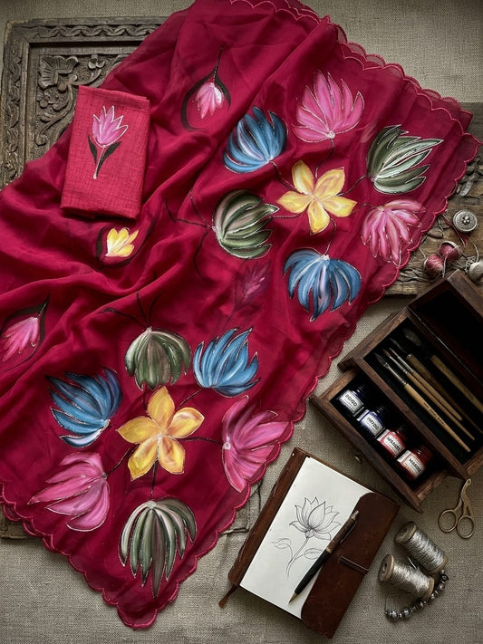 Elegant Hand-Painted Organza Saree with Artistic Floral Motifs